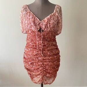 Free people ruched short sleeved mini dress with keyhole and open back